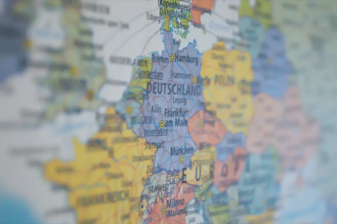 Blurred map of Germany and central Europe, illustrating capital flowing into European VC funds